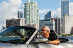 middle age man in a convertible automobile