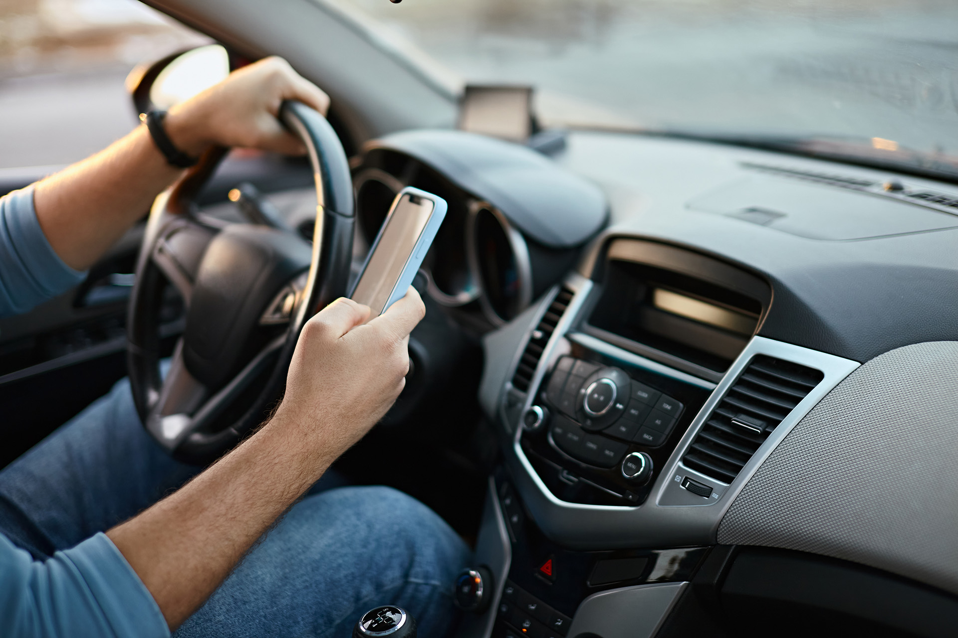 Car Accidents Caused by Social Media AdobeStock 566378520